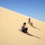 Desert Dune Bashing, Camel Ride, Sandboarding & Inland Sea. - Return to Doha