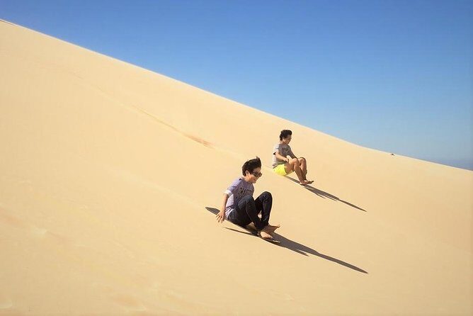 Desert Dune Bashing, Camel Ride, Sandboarding & Inland Sea. - Return to Doha