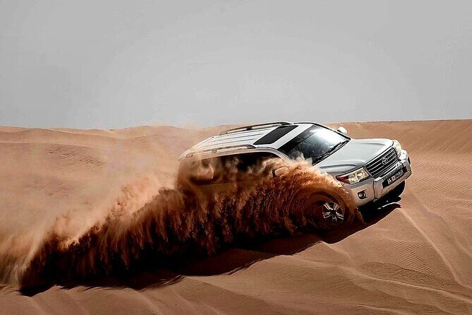 Desert Safari Dubai High Red Dunes, Camel Ride, BBQ At Camp - The Sum Up