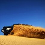 Desert Safari Dubai with BBQ - dinner, Sandboarding - The Bedouin-Inspired Camp and BBQ Dinner
