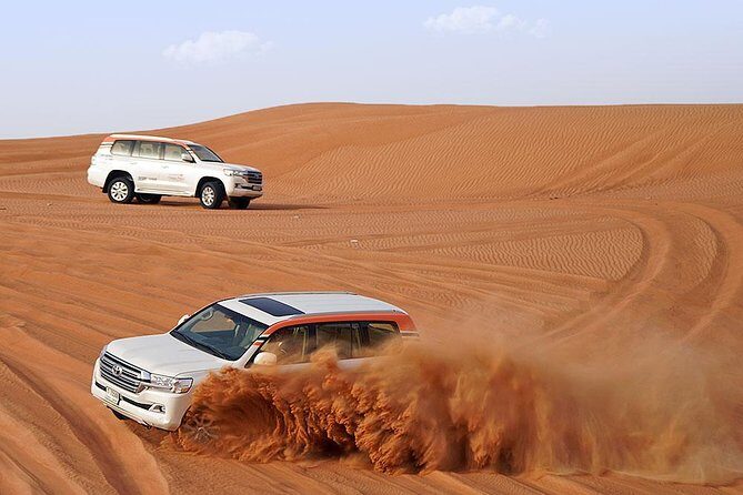 Desert Safari in 4X4 through Lahbab Desert with BBQ Dinner - The Dune Bashing: Heart-Racing Adventure