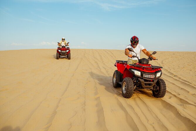 Desert Safari Quad Bike and Camel Experience with BBQ Dinner - What to Expect: From Dunes to Dinner