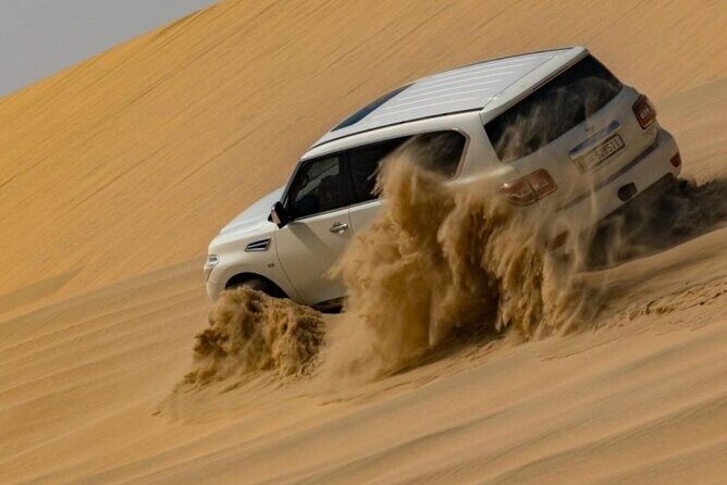 Doha Half Day Desert Safari Dune Bashing Camel Ride Sandboarding - What We Loved