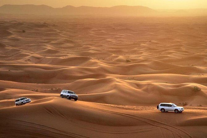 Dubai Desert Safari, Dune Bashing, Camel Ride, Sandboarding & BBQ - Dune Bashing: Heart-Pounding Fun