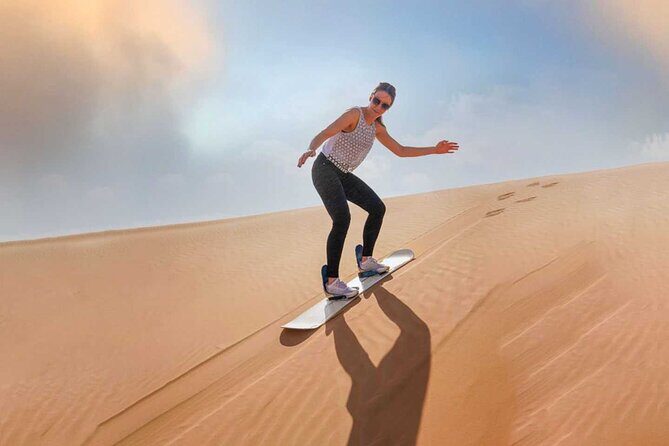 Dubai: Desert Safari With Quad Bike, Camel Ride & Dinner - Sandboarding and Photo Opportunities