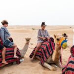 Dubai Desert Safari with Quads, BBQ Dinner, Camel ride, & Shows - Returning to Dubai