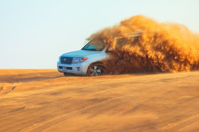 Dubai Evening Desert Safari With Transfers Dune Bashing & Dinner - What Travelers Should Know