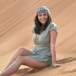 Dubai Sunset Red Dune Desert Safari, Sandboarding and Camel Ride - What Travelers Love About This Tour