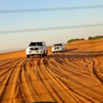 Dubai Tour and Desert Safari: Sand Boarding & BBQ Dinner Combo - Transition to the Desert Experience
