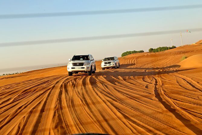 Dubai Tour and Desert Safari: Sand Boarding & BBQ Dinner Combo - Transition to the Desert Experience