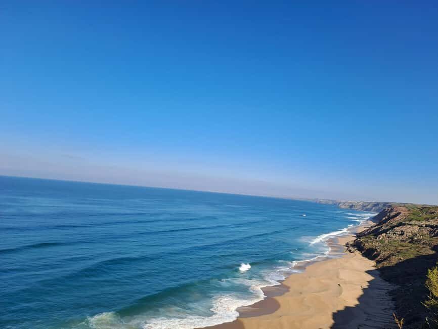 Ericeira: Surf Guide Tour to Nazaré with Transportation - Transportation & Group Dynamics