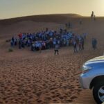 Evening Desert Safari with BBQ Dinner, Sandboarding and Camel Ride Experience - Authentic Traveler Insights