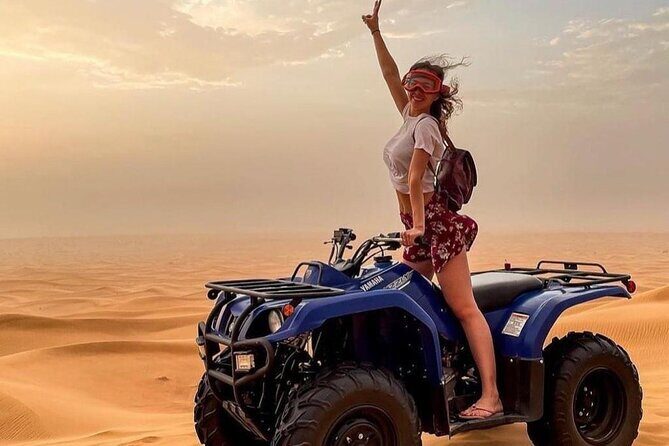 Evening Red Dunes Safari with Quad Biking, BBQ Dinner & LiveShows - Arrival at Lahbab Desert: Camels and Quad Biking