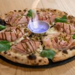 Gourmet Pizza Experience with Drinks and Dessert in Lecce - The Atmosphere and Hosts