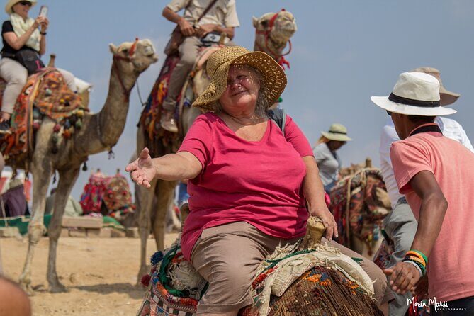 Half Day Tour To Giza Pyramids & The Great Sphinx With Camel Ride - Visiting the Pyramids of Khufu and Panoramic Views