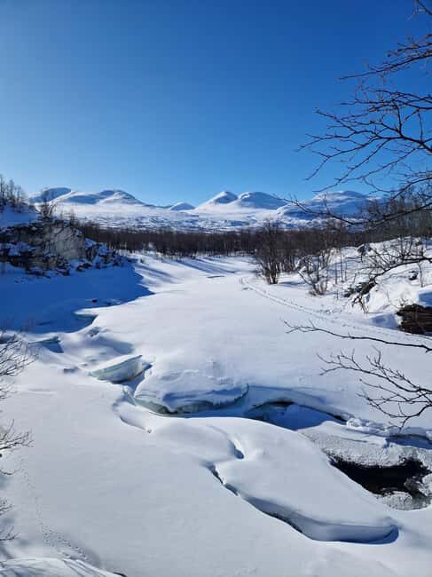 Kiruna: Abisko National Park Snowshoe Hike with Lunch - The History of the Iron Ore Railway