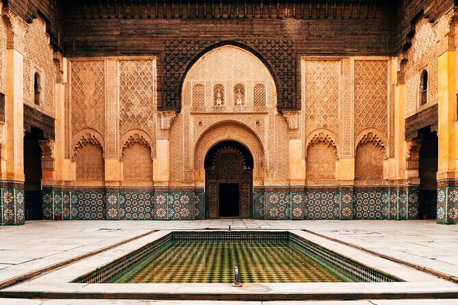 Marrakech: Ben Youssef & Secret Garden & Souks Guided Tour - Starting Point: Hôtel Restaurant Café de France