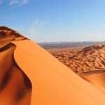 Morning Red Dunes Safari: Camel Ride & Sandboarding Adventure - Dune Bashing — An Adrenaline Rush