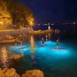 Opatija: Guided SUP Paddleboarding Adventure at Night - The Sum Up