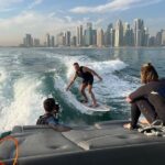 Private Wakesurfing or Wakeboarding along Doha's skyline - Who Will Enjoy This the Most?