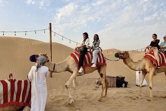 Red Desert Safari With Camel Ride & Sand Skiing - Transportation and Group Dynamics
