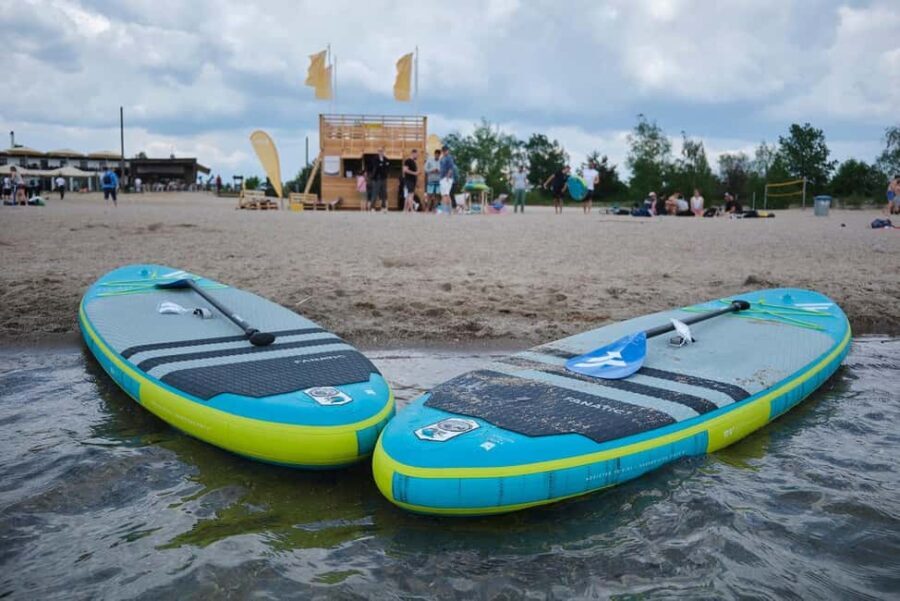 Rent a stand-up-paddling board - Discovering Lake Cospuden: A Fresh Water Escape Near Leipzig