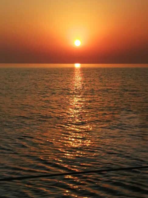 Rhodes: Sunset Catamaran Cruise with Snack, Fruits & Drinks - The Atmosphere and Crew