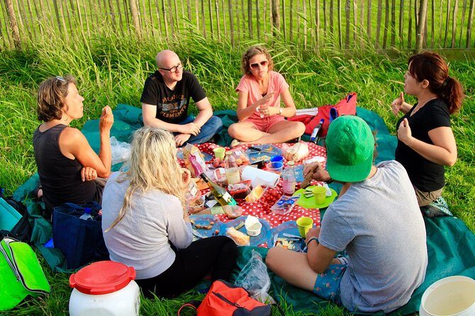 Small-Group Guided Sunset Canoe Tour in Waterland with Dinner - The Experience in Detail