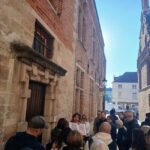 Small-Group Nostalgic Walking Tour of Bruges with praline - What Makes This Tour Stand Out?