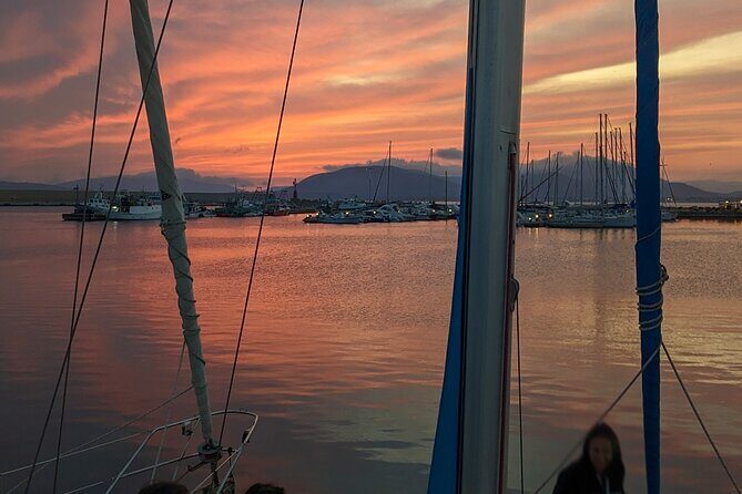 Sunset and Aperitif on a Sailing Boat in Alghero - Analyzing the Value