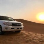 Sunset Desert Safari With BBQ Dinner, Camel Ride, Belly Dancing from Dubai - Transportation & Group Size