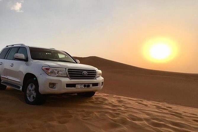 Sunset Desert Safari With BBQ Dinner, Camel Ride, Belly Dancing from Dubai - Transportation & Group Size