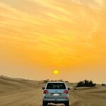 Sunset Safari with BBQ Dune Drive Camel Ride & Dune Buggy option - First Stop: The Desert Bash
