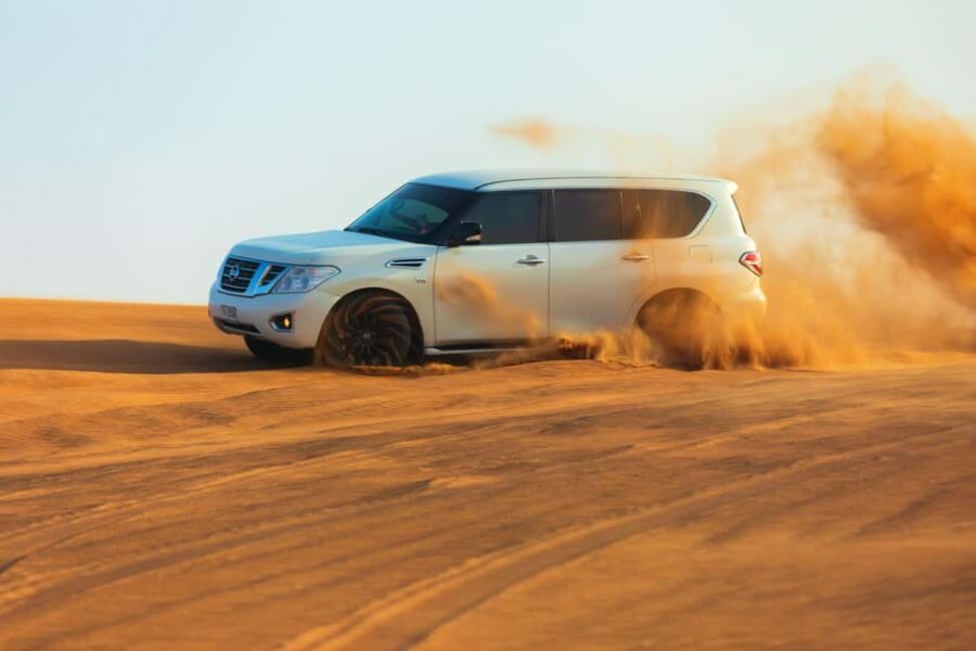 Abu Dhabi: Desert Safari, Quad Bike, Camels & Sandboarding - Duration, Transport, and Group Size
