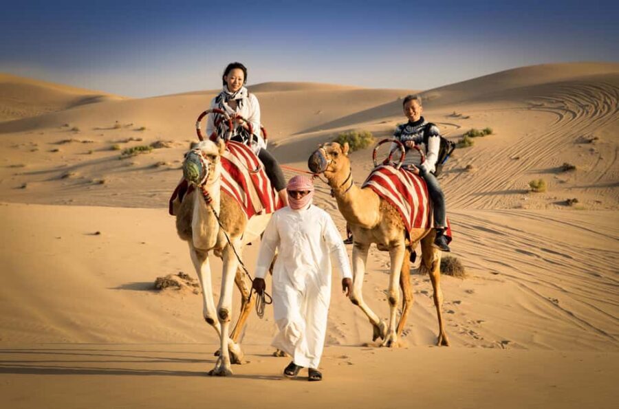 Abu Dhabi: Desert Safari with BBQ, Camel Ride & Sandboarding - Authentic Experiences Highlighted by Travelers