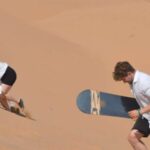 Agadir/Taghazout : Sandboarding & Sunset Camel Ride with BBQ - Reaching the Timlaline Sahara Dunes