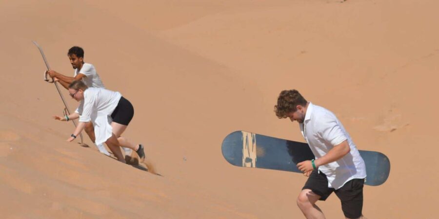 Agadir/Taghazout : Sandboarding & Sunset Camel Ride with BBQ - Reaching the Timlaline Sahara Dunes