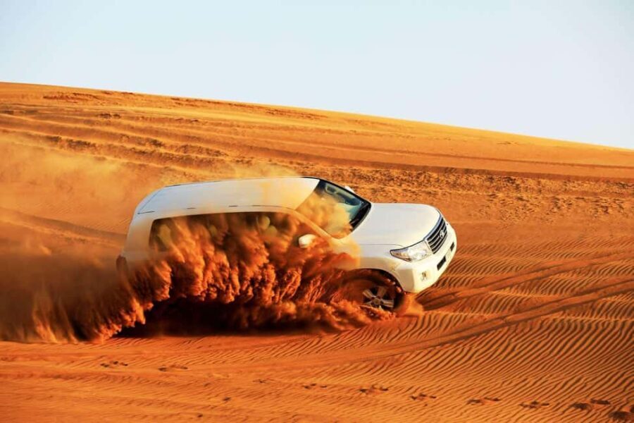 Desert Safari Dubai with Camel Ride, Sandboarding & Dinner - Dune Bashing: The Heart of the Desert Experience