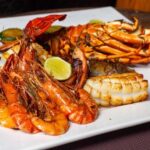 Diani Beach: Sunset Dhow Cruise with Dinner - Key Points