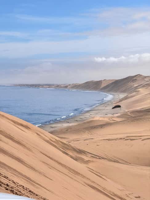 Sandwich Harbour Experience  Where Dunes Kiss the Ocean - Practical Details