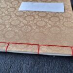 Making a traditional notebook & naming on it in Hangeul in Seoul - Personalization and Cultural Touches