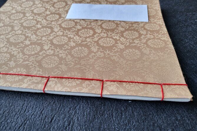 Making a traditional notebook & naming on it in Hangeul in Seoul - Personalization and Cultural Touches