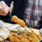 Osaka: Food Tour Kuromon Market & Dotonbori with Guide - Exploring Kuromon Market