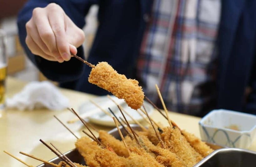 Osaka: Food Tour Kuromon Market & Dotonbori with Guide - Exploring Kuromon Market