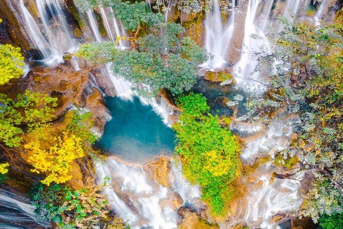 Pak Ou Caves and Kuang Si Fall Day Tour - Visiting a Rural Village