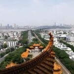 Wuhan: Yellow Crane Tower & Yangtze River Bridge Tour - Yellow Crane Tower: A Poetic Legend and Icon