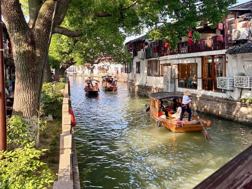 Zhujiajiao Water Town & Shanghai Highlights Day Tour - Detailed Breakdown of the Day