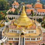 Zhengzhou to Luoyang: UNESCO Grottoes, Temples & Old Town - Awe-Inspiring Artistry at Longmen Grottoes