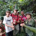 Chiang Rai: Jungle Trek, Waterfall, and Bamboo Raft Tour - The Waterfall and Village Experience