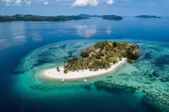 Coron Reefs and Wrecks Tour - Stop 2: Pass Island – White Sand Relaxation